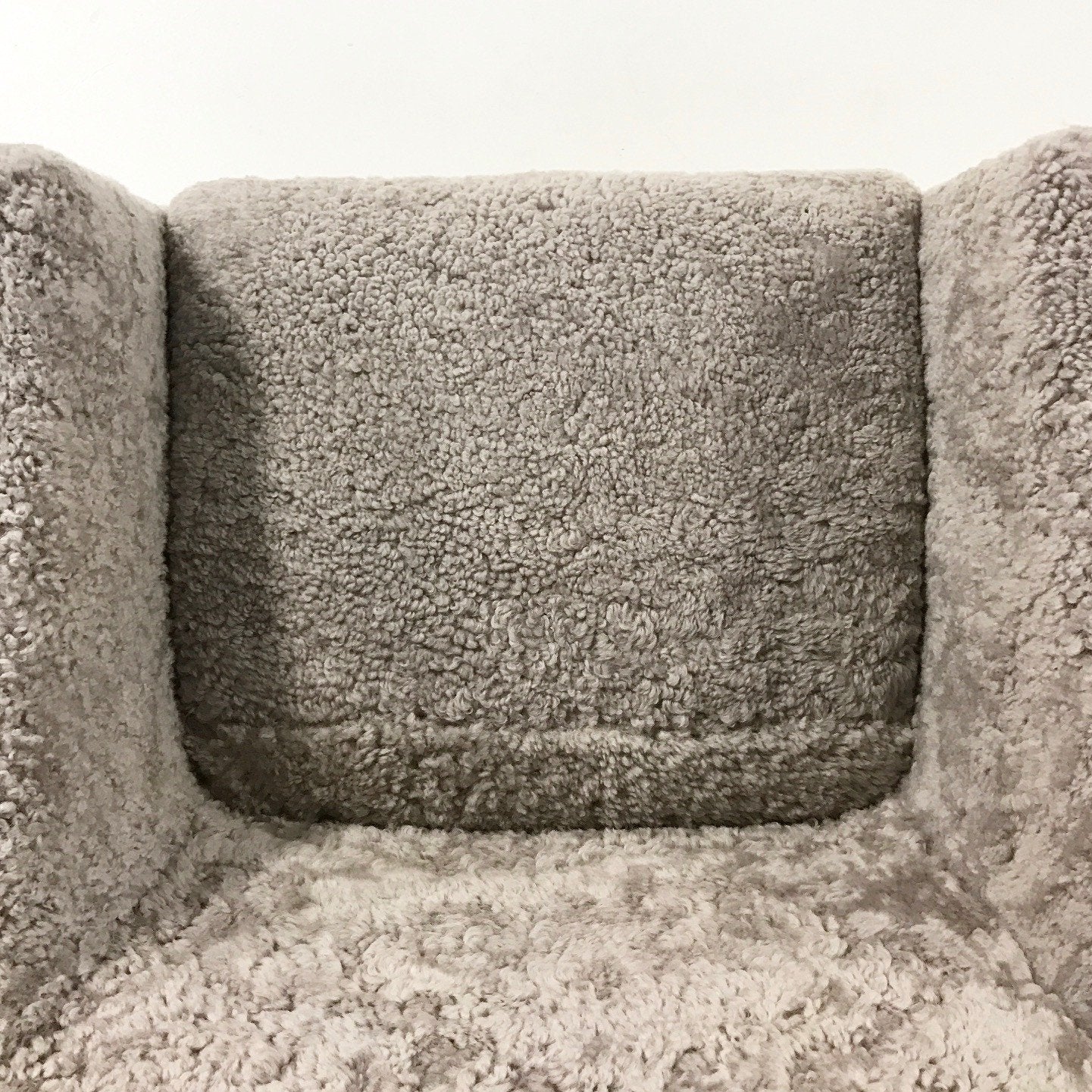 Hugh Acton Armchair with Metal Base in Short Grey Sheepskin