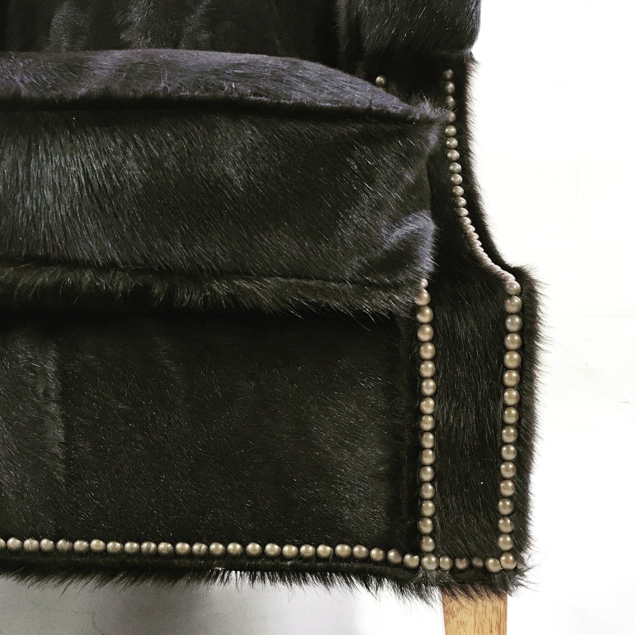 Wingback Chairs in Natural Black Brazilian Cowhide