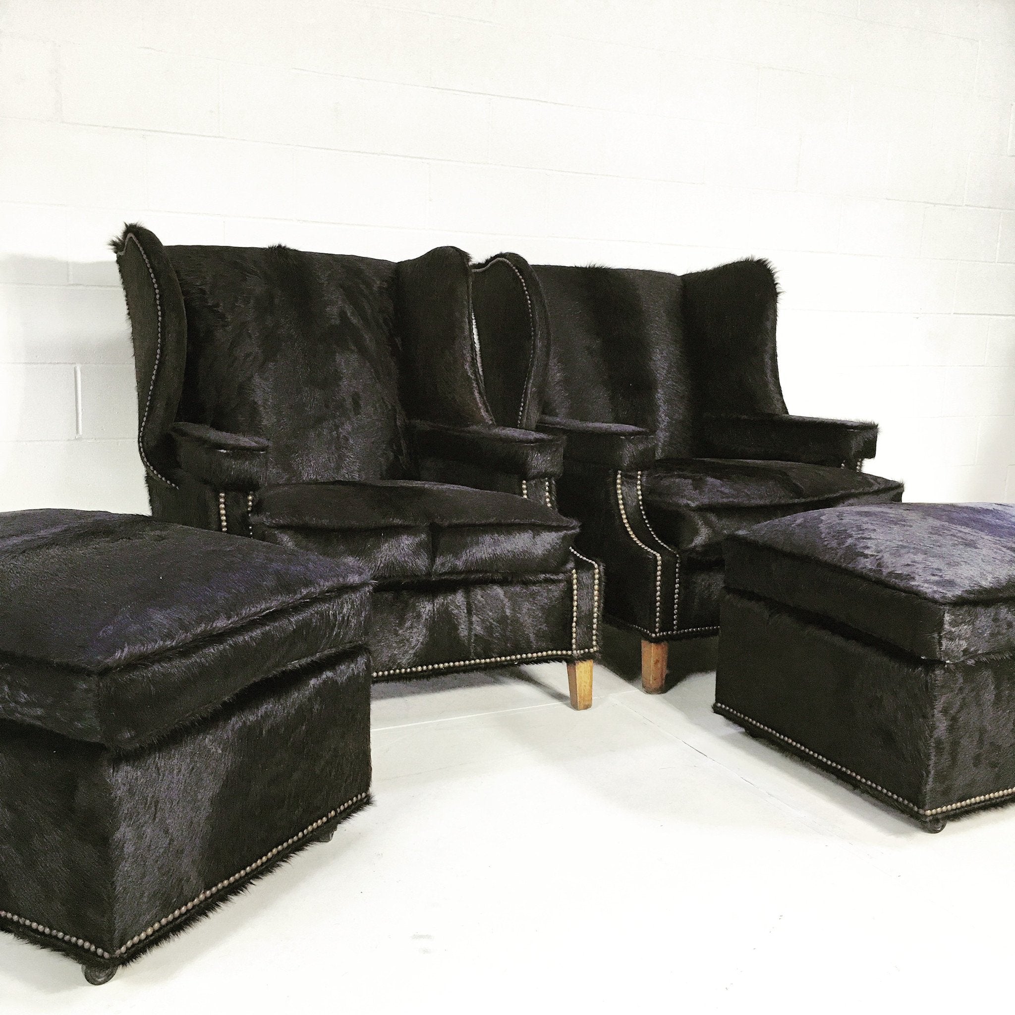 Wingback Chairs in Natural Black Brazilian Cowhide