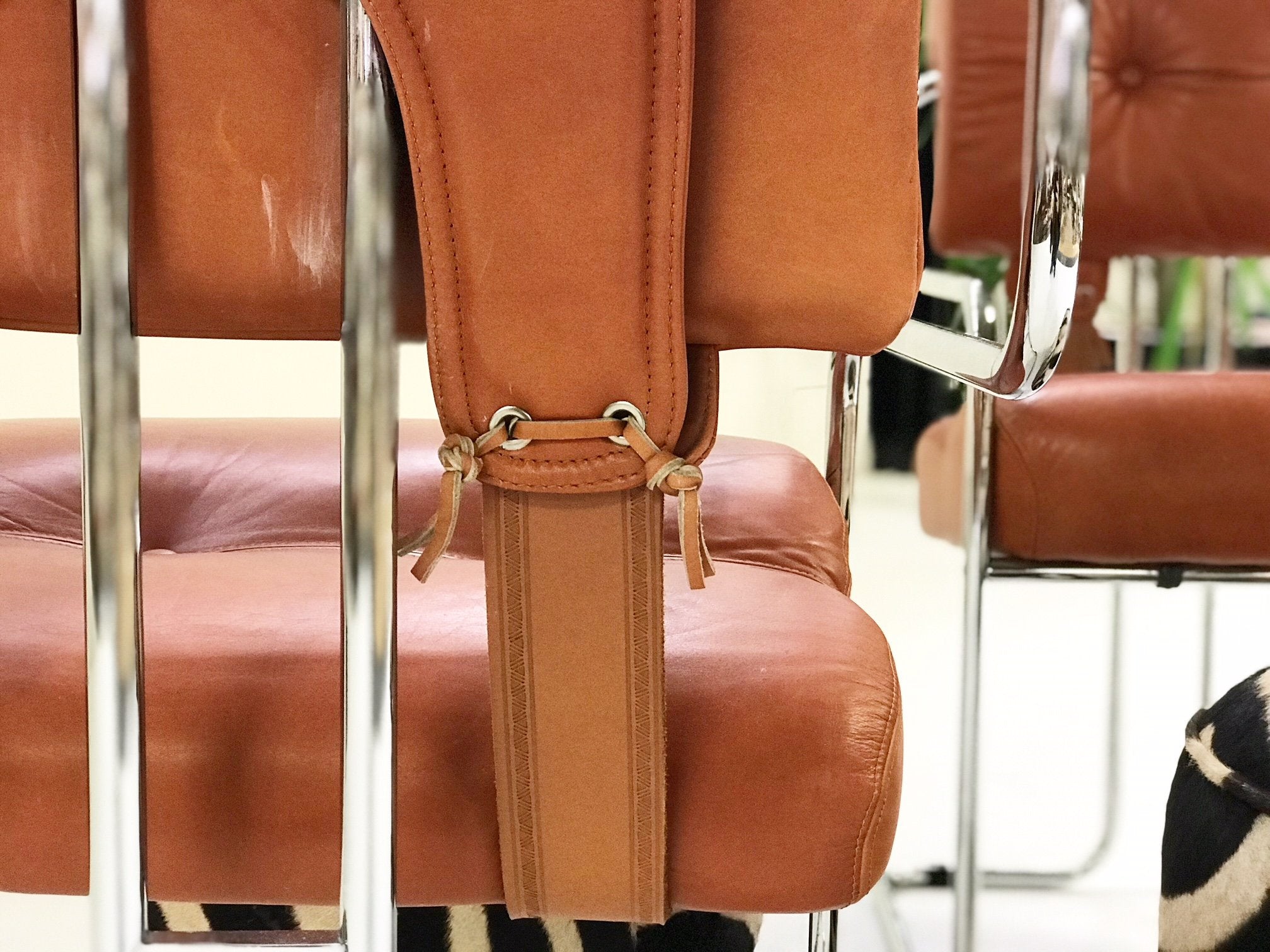 Pair of Italian Leather Tucroma Chairs by Mariani for Pace Collection with Zebra Hide Pouf Ottomans