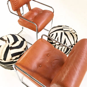 Pair of Italian Leather Tucroma Chairs by Mariani for Pace Collection with Zebra Hide Pouf Ottomans