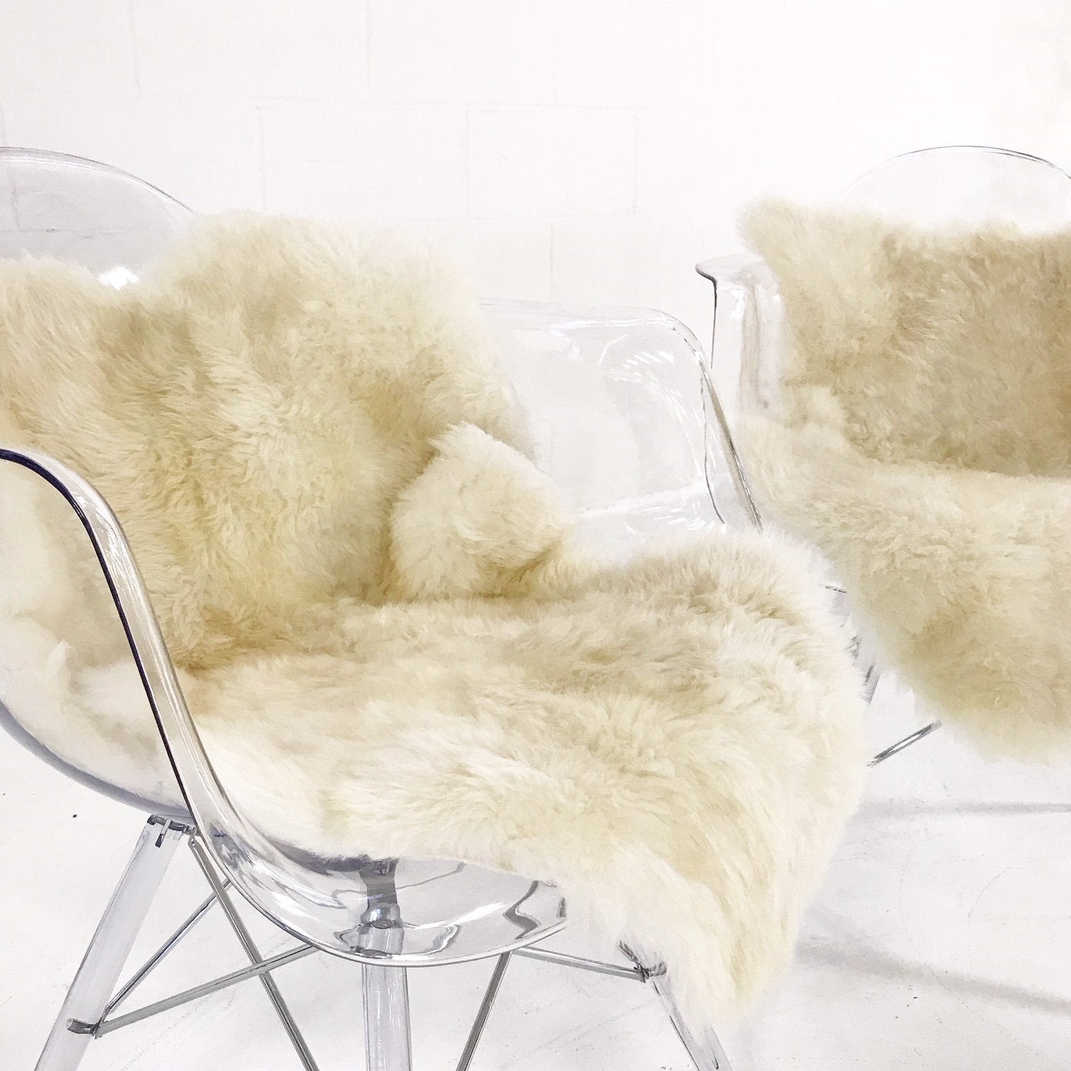 Mid-Century Style Lucite Chairs with Ivory Brazilian Sheepskin Throws
