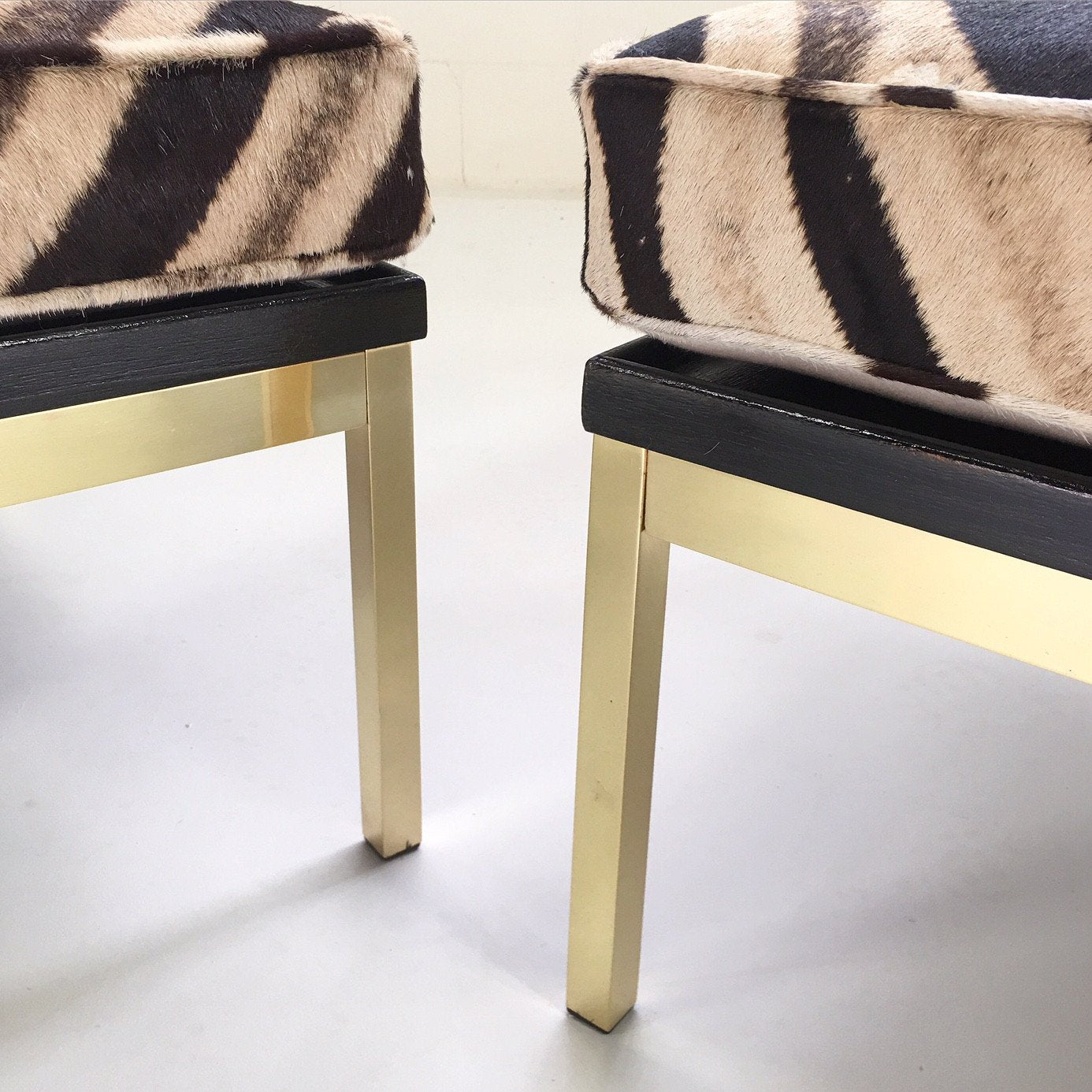 Knoll Style Zebra Hide and Brass Ottomans - Set of Two