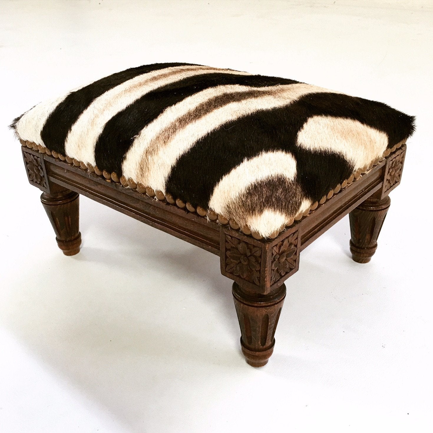 Carved Wood Foot Stool in Zebra Hide
