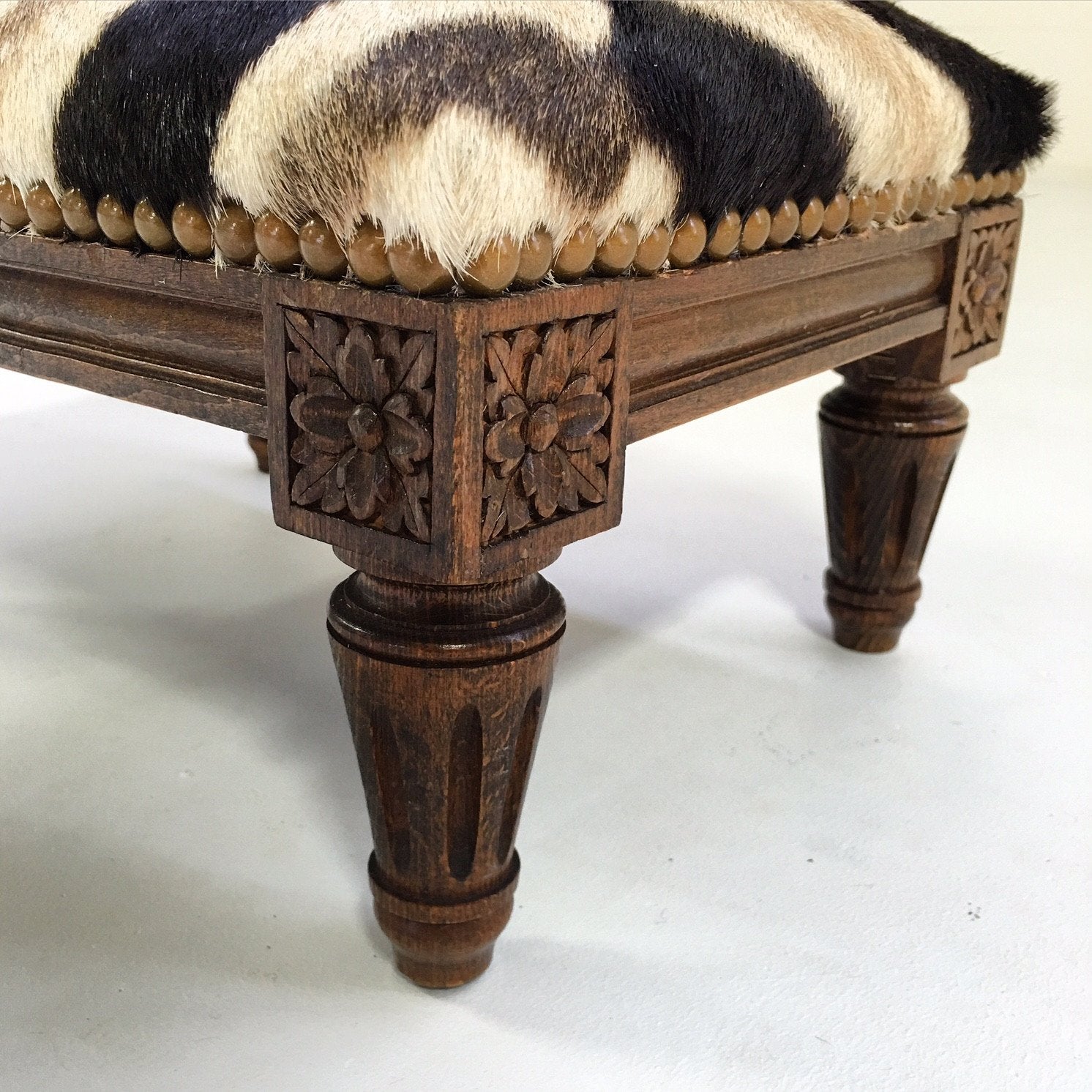 Carved Wood Foot Stool in Zebra Hide
