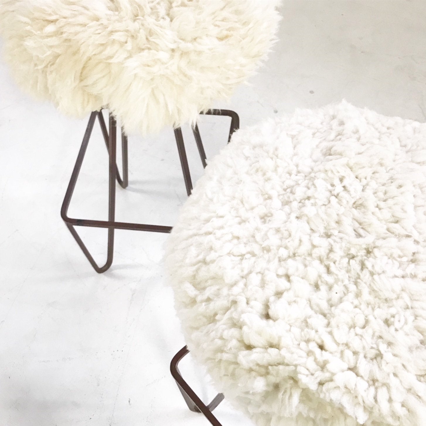 Weinding Stools Reupholstered in Brazilian Sheepskin