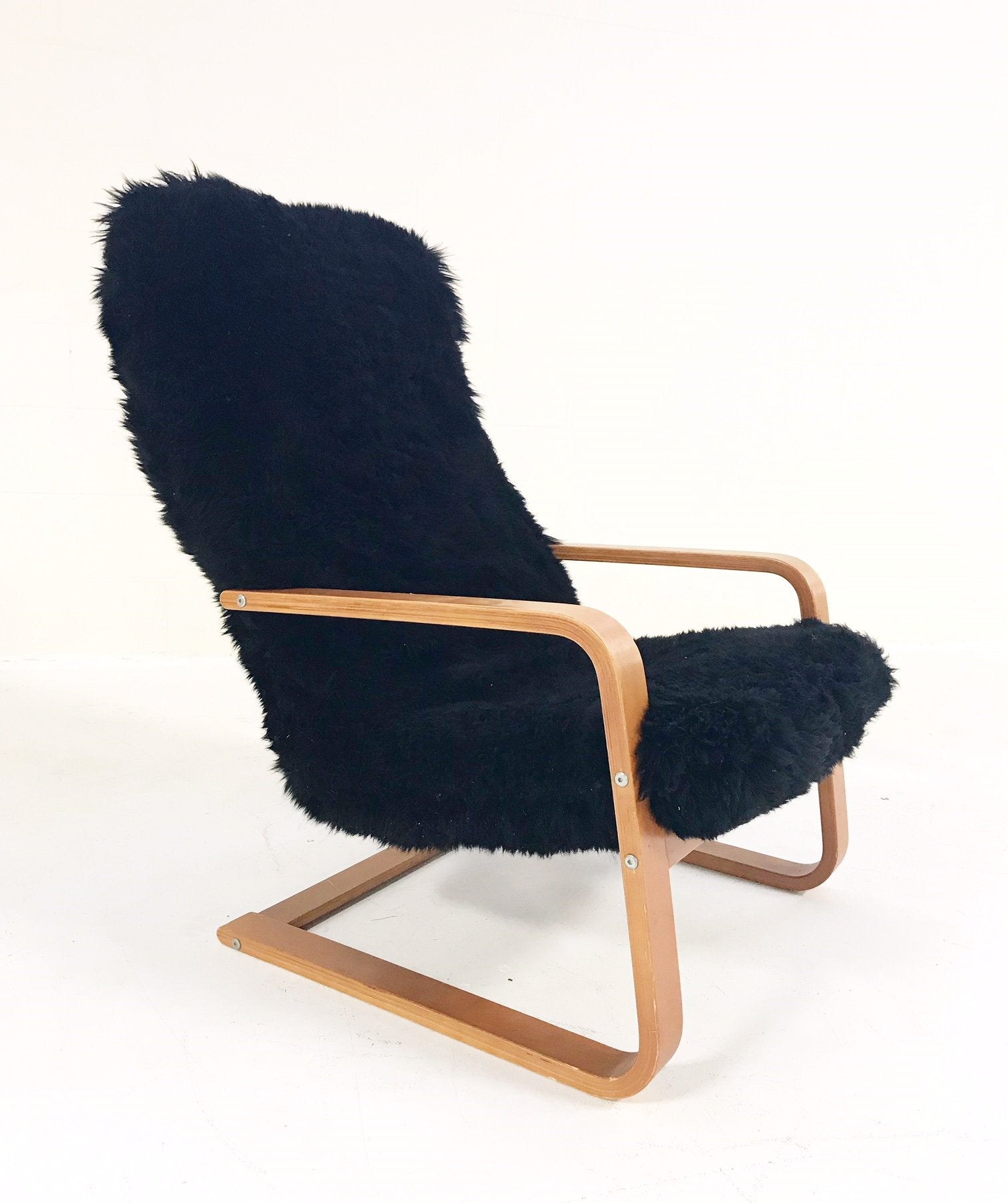 Mid-Century Lounge Chair in Black Brazilian Sheepskin