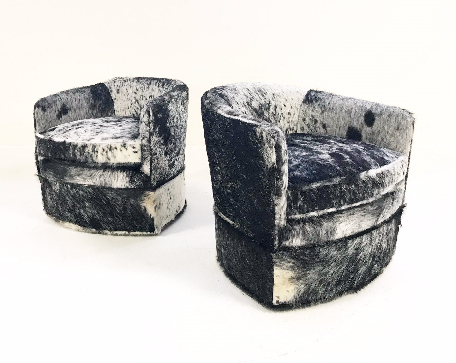 Milo Baughman Wheeled Slipper Chairs Restored and Reupholstered in Black and White Speckled Brazilian Cowhide