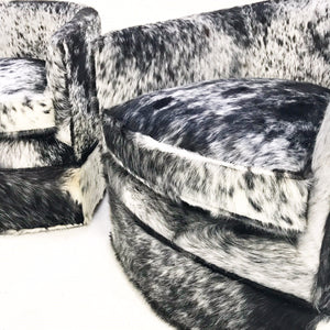 Milo Baughman Wheeled Slipper Chairs Restored and Reupholstered in Black and White Speckled Brazilian Cowhide