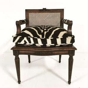 FRENCH LOUIS XVI STYLE BOUDOIR CHAIR WITH CANED BACK AND SEAT AND CUSTOM ZEBRA HIDE CUSHION