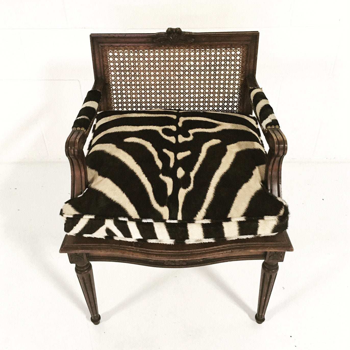 FRENCH LOUIS XVI STYLE BOUDOIR CHAIR WITH CANED BACK AND SEAT AND CUSTOM ZEBRA HIDE CUSHION