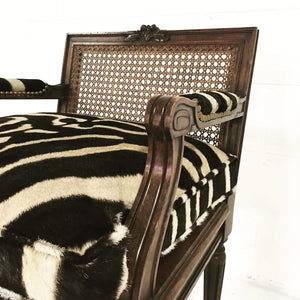 FRENCH LOUIS XVI STYLE BOUDOIR CHAIR WITH CANED BACK AND SEAT AND CUSTOM ZEBRA HIDE CUSHION