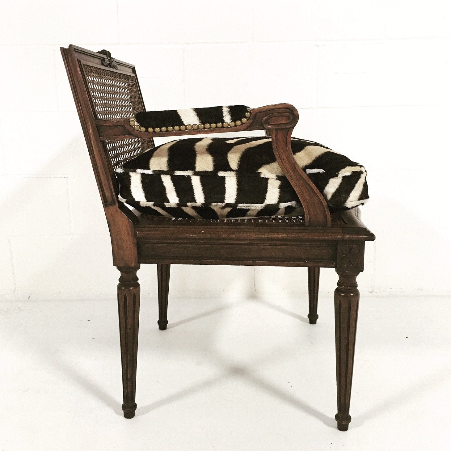FRENCH LOUIS XVI STYLE BOUDOIR CHAIR WITH CANED BACK AND SEAT AND CUSTOM ZEBRA HIDE CUSHION