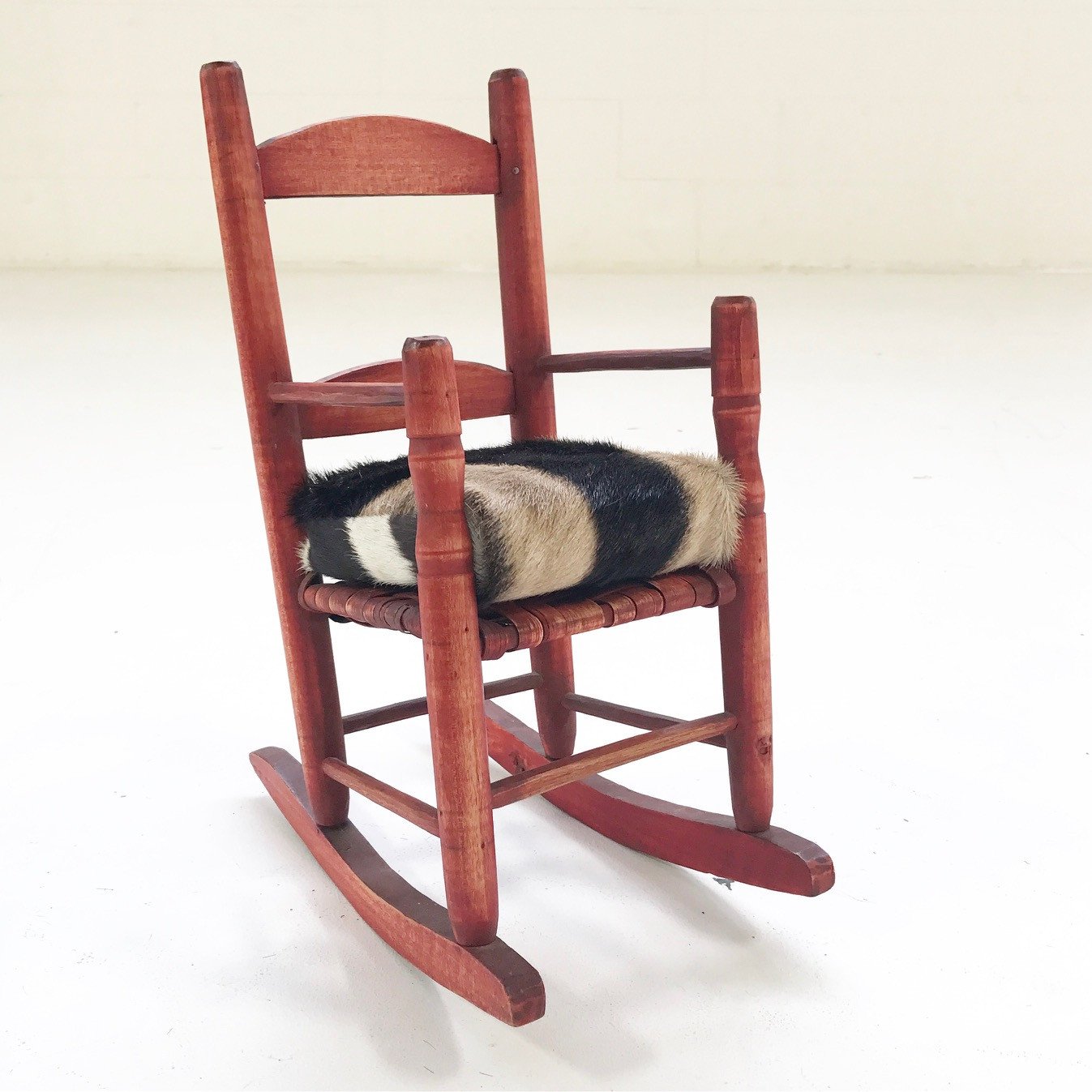 Mini Red Rocker with Zebra Hide Cushion