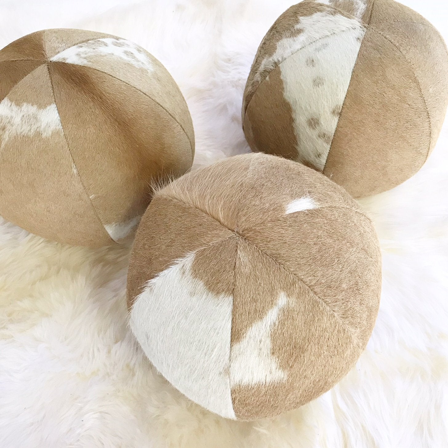 Palomino & White Cowhide Ball Pillow 12"