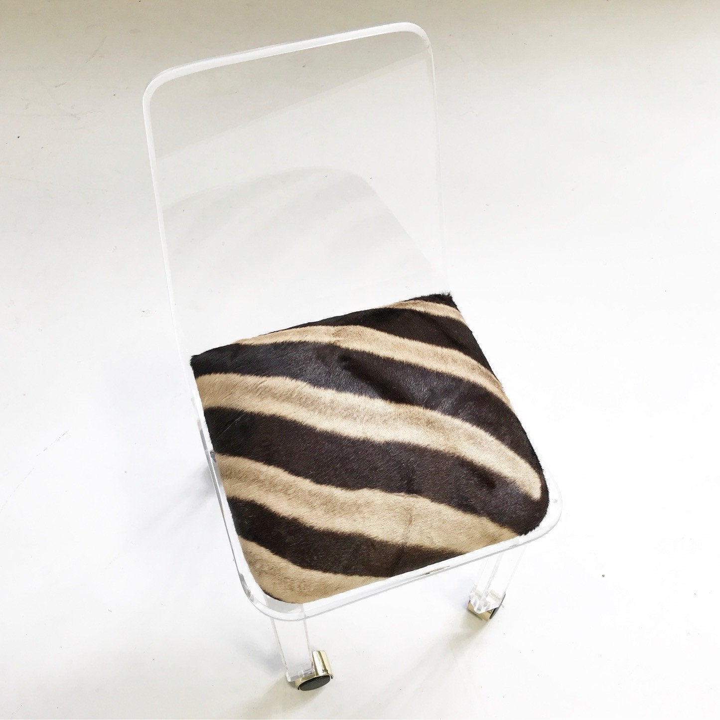 Lucite Desk Chair on Wheels in Zebra Hide