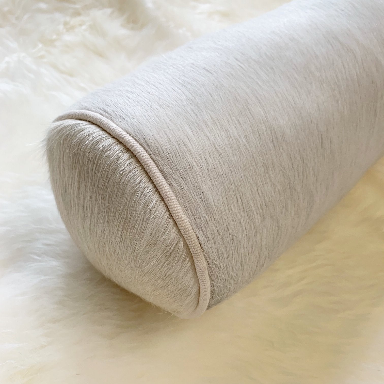 IVORY BRAZILIAN COWHIDE BOLSTER PILLOW 20"