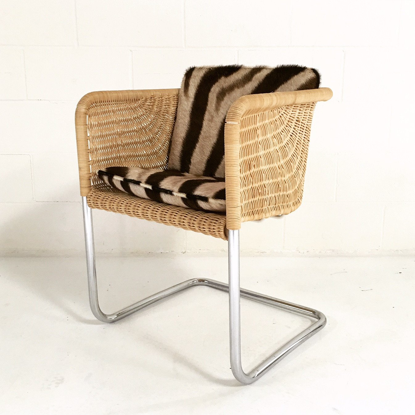 HARVEY PROBBER WICKER AND CHROME CHAIR WITH ZEBRA CUSHIONs