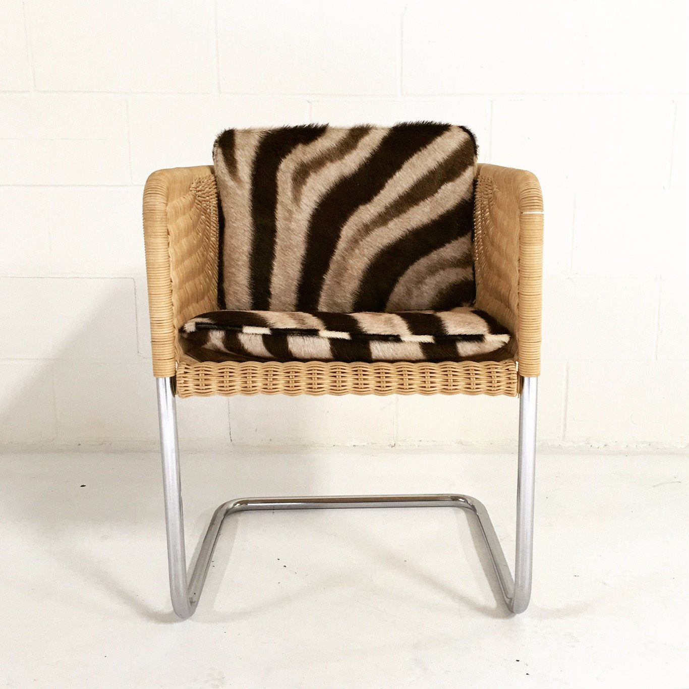 HARVEY PROBBER WICKER AND CHROME CHAIR WITH ZEBRA CUSHIONs