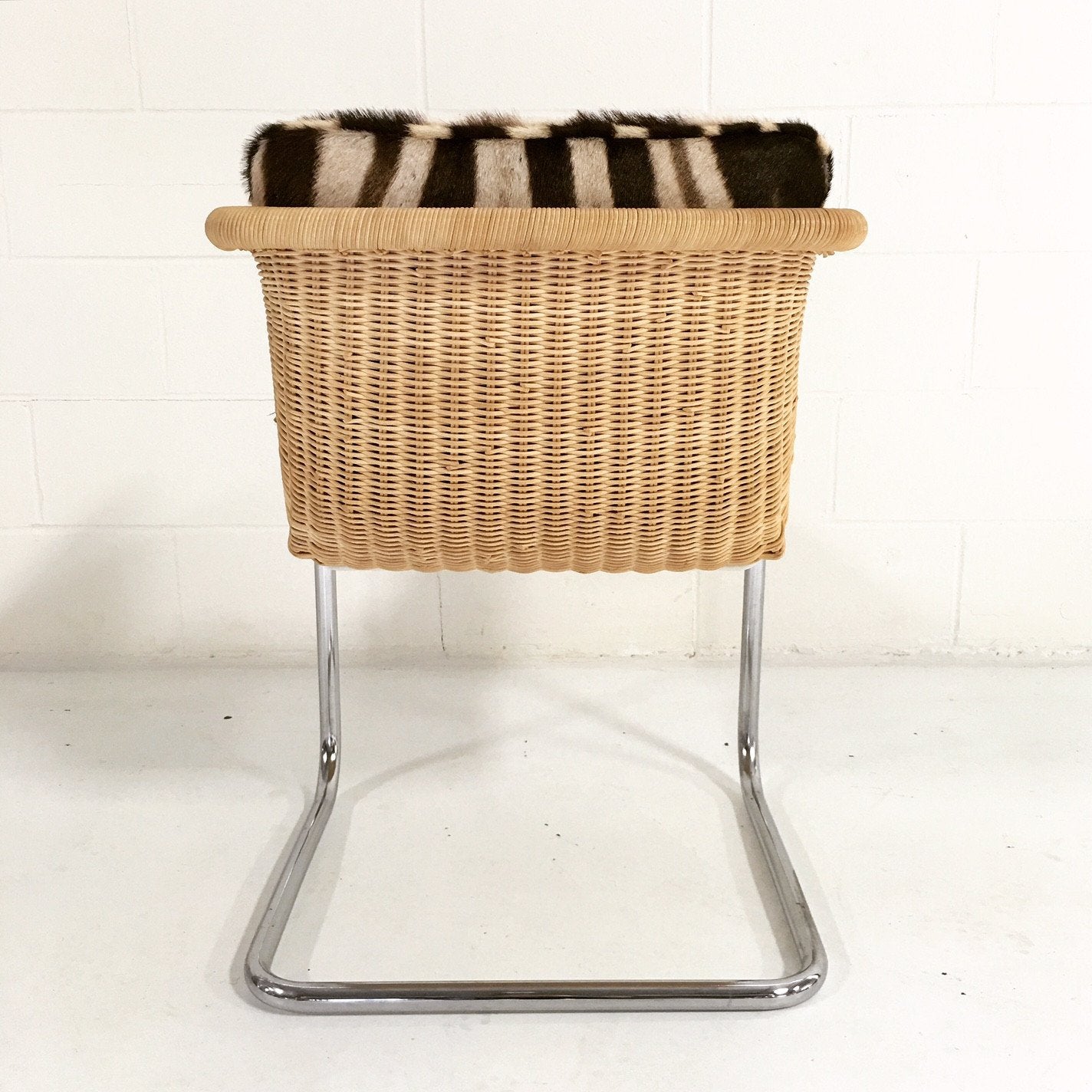 HARVEY PROBBER WICKER AND CHROME CHAIR WITH ZEBRA CUSHIONs