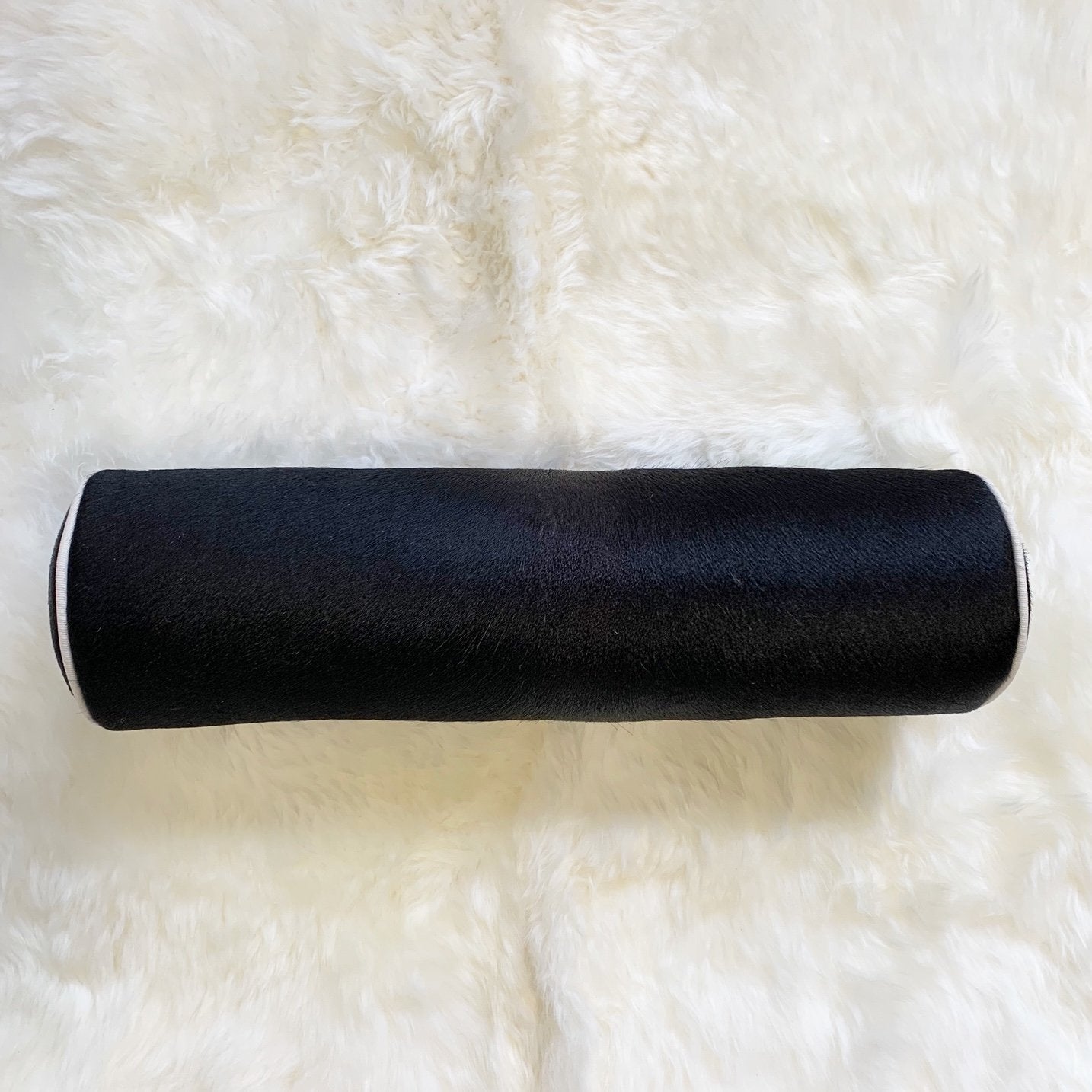 BLACK BRAZILIAN COWHIDE BOLSTER PILLOW 20"