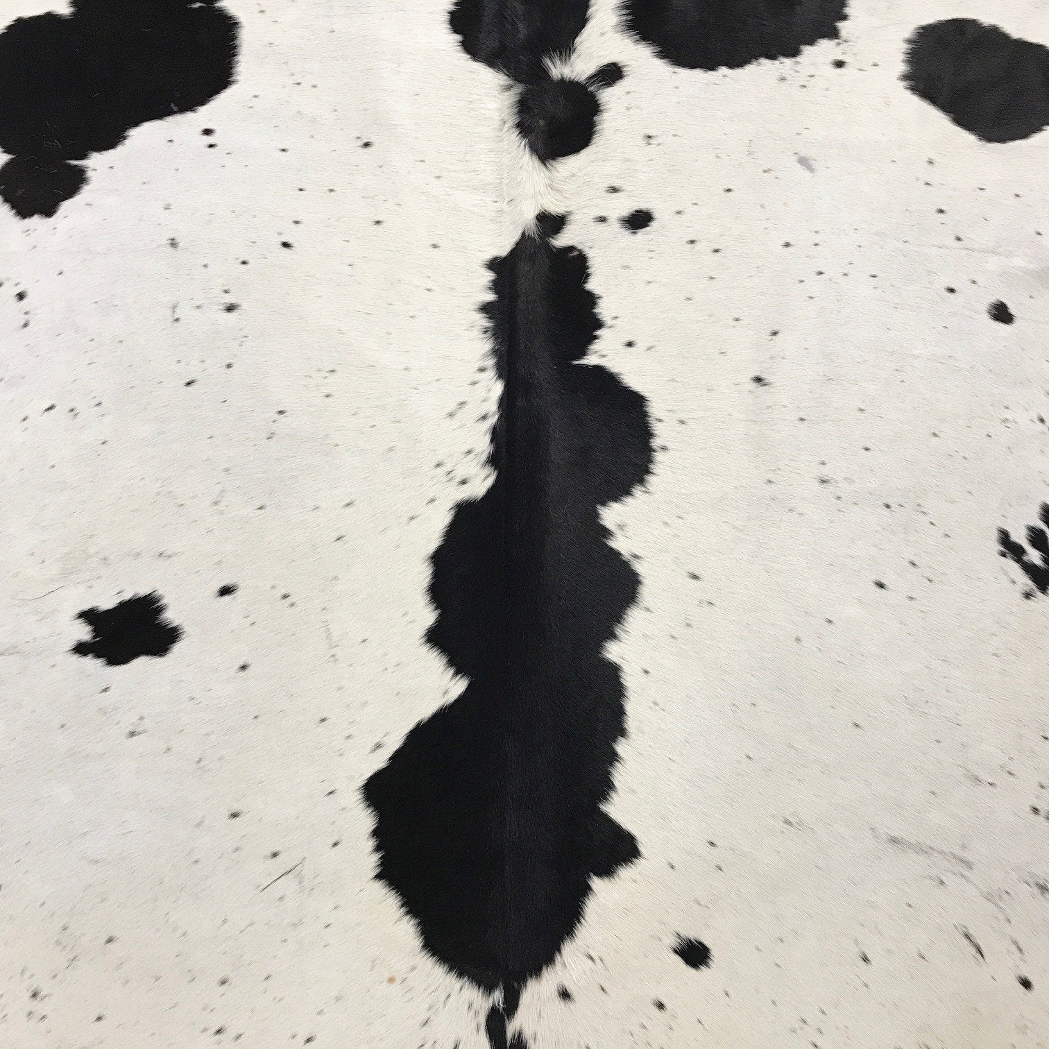 BLACK & WHITE SPECKLED COWHIDE RUG - BLADEN