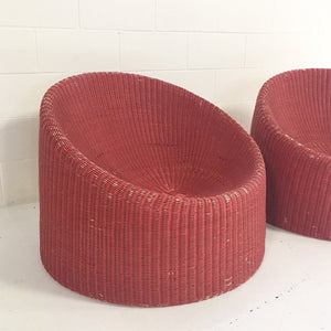 PAIR of EERO AARNIO FOR STENDIG WOVEN RATTAN LOUNGE CHAIRS WITH SHEEPSKIN THROWS
