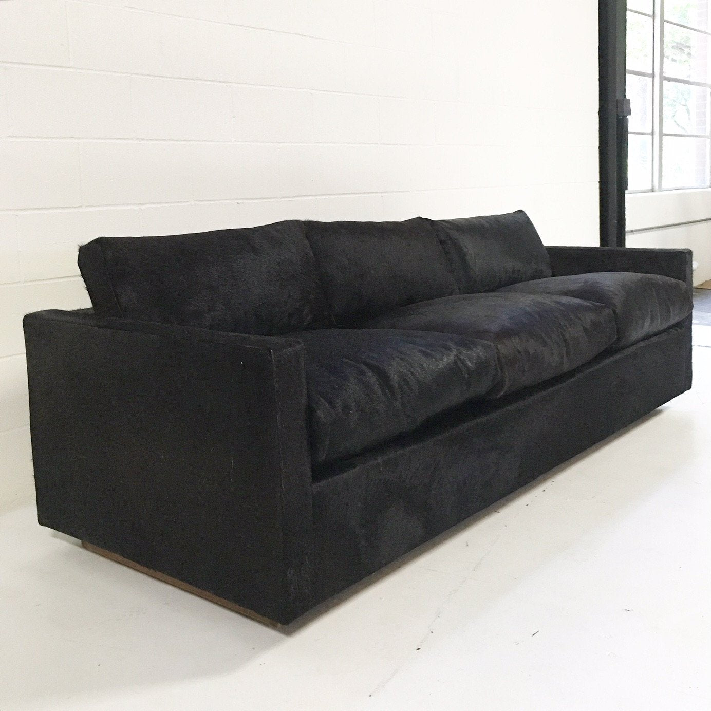 Pair of Mid-Century Sofa and Chair in Natural Black Cowhide