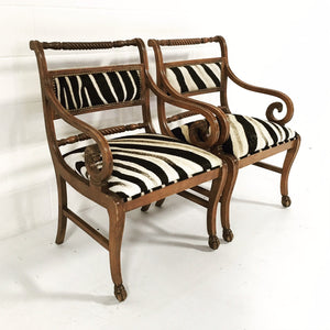 PAIR OF VINTAGE CARVED ARMCHAIRS IN ZEBRA HIDE