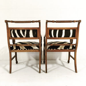 PAIR OF VINTAGE CARVED ARMCHAIRS IN ZEBRA HIDE