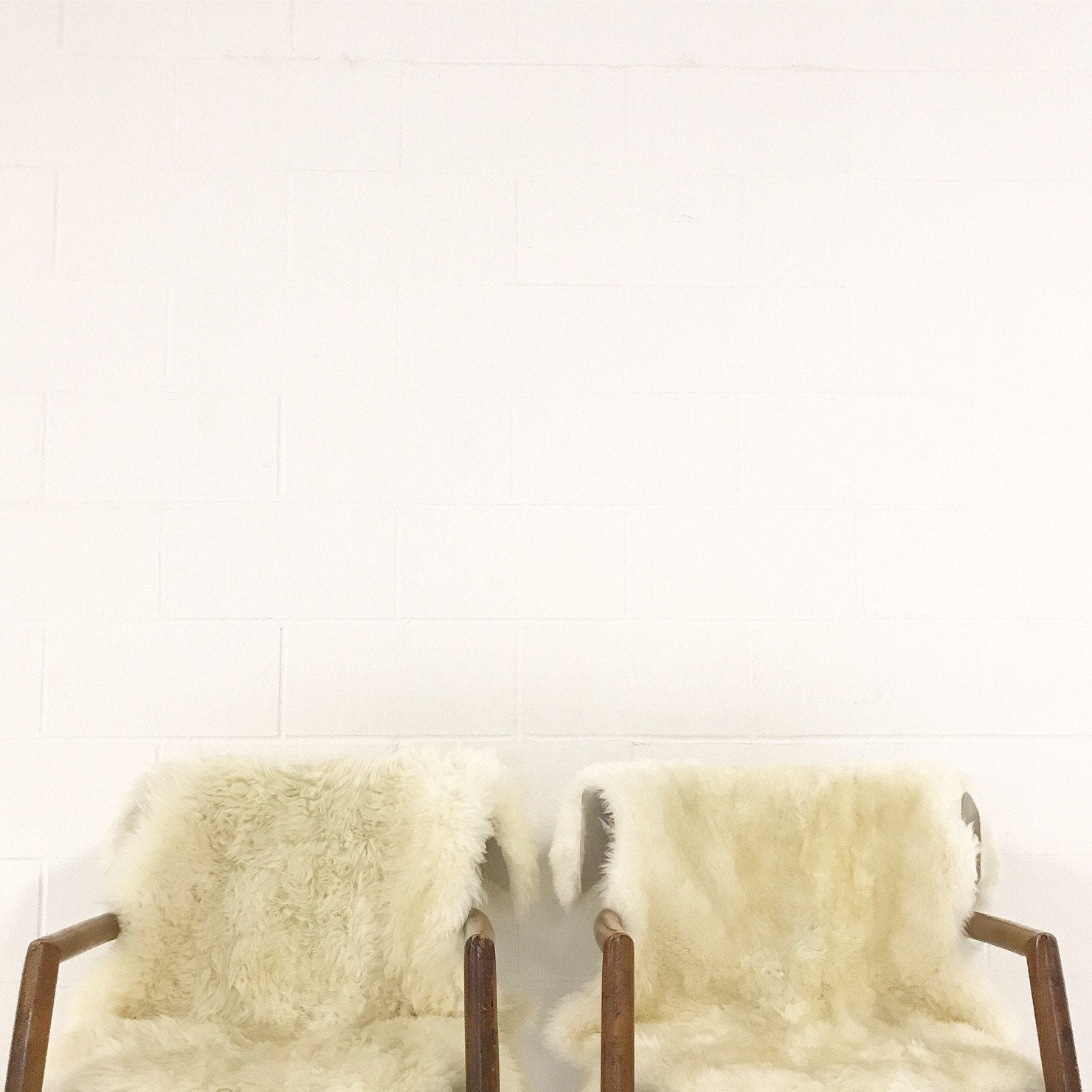 Paul McCobb Captain Chairs with Brazilian Sheepskins