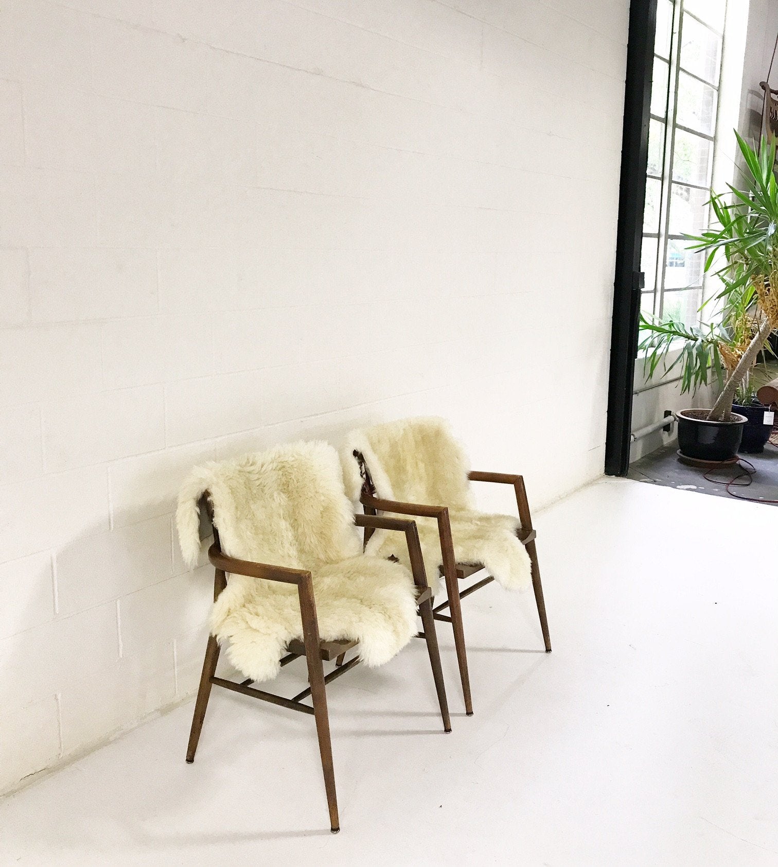 Paul McCobb Captain Chairs with Brazilian Sheepskins