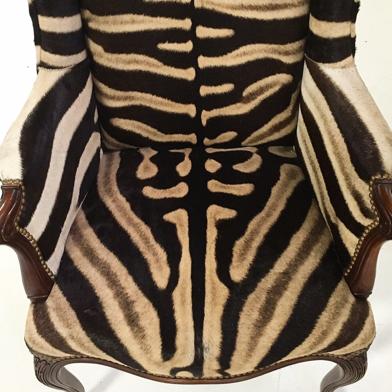 ENGLISH MAHOGANY WINGBACK ARMCHAIR IN Zebra