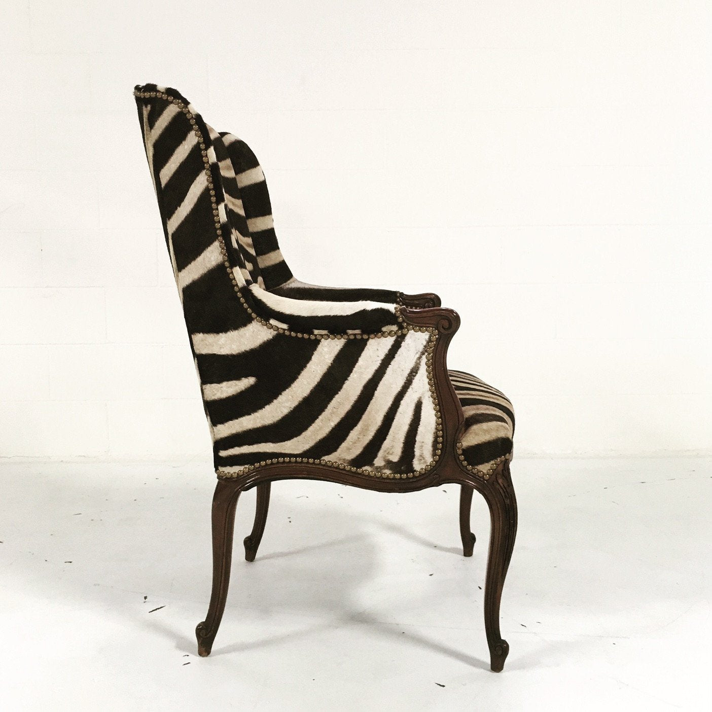 ENGLISH MAHOGANY WINGBACK ARMCHAIR IN Zebra