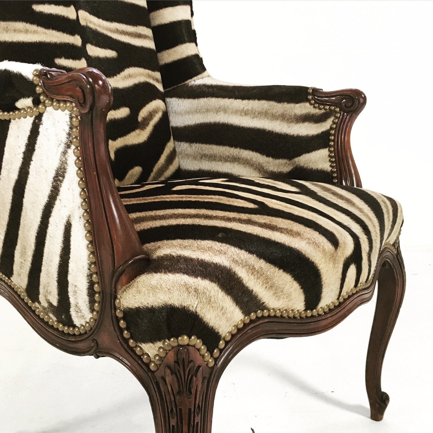 ENGLISH MAHOGANY WINGBACK ARMCHAIR IN Zebra