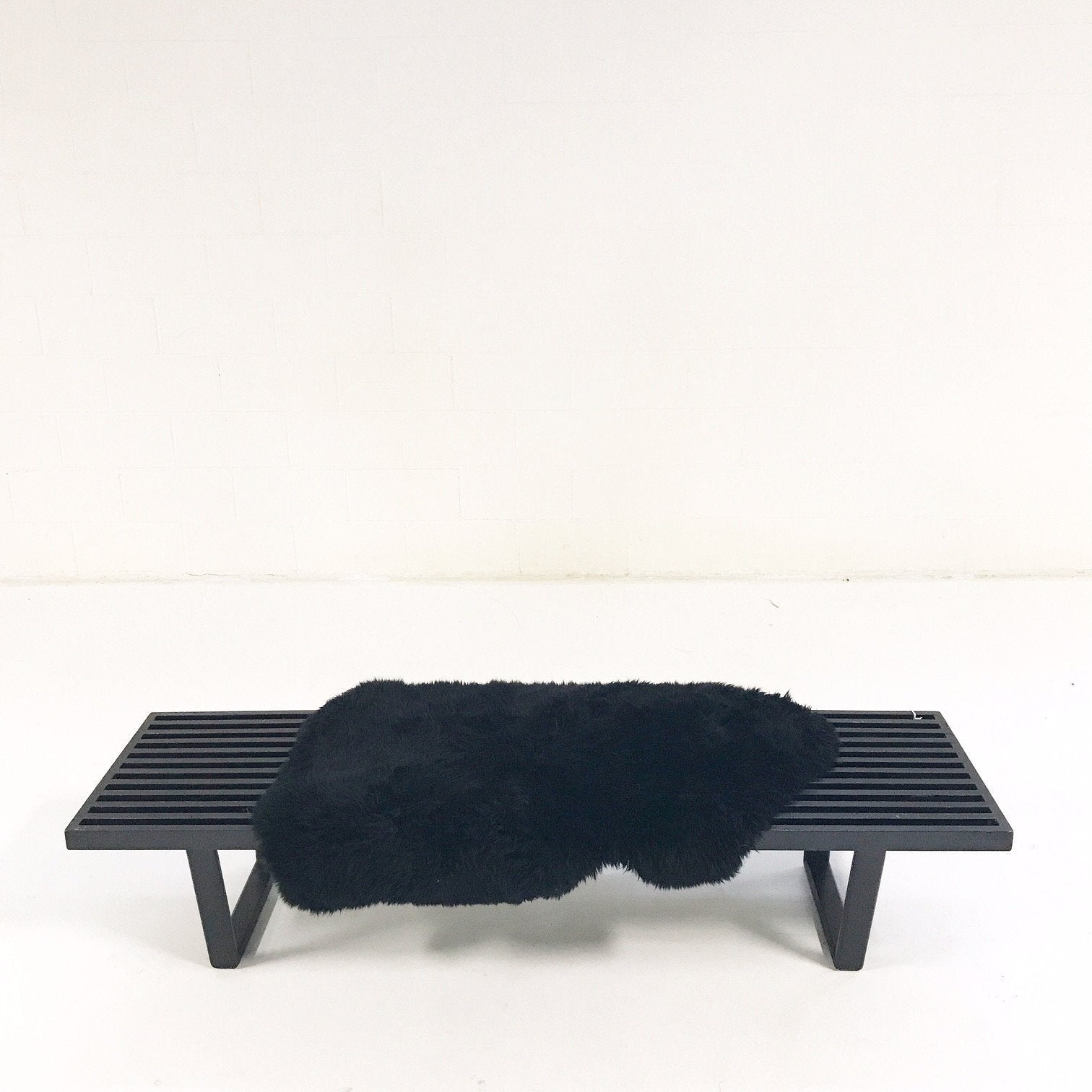 A Model 4692 Platform Bench, George Nelson & Associates for Herman Miller with Brazilian Sheepskin Throw