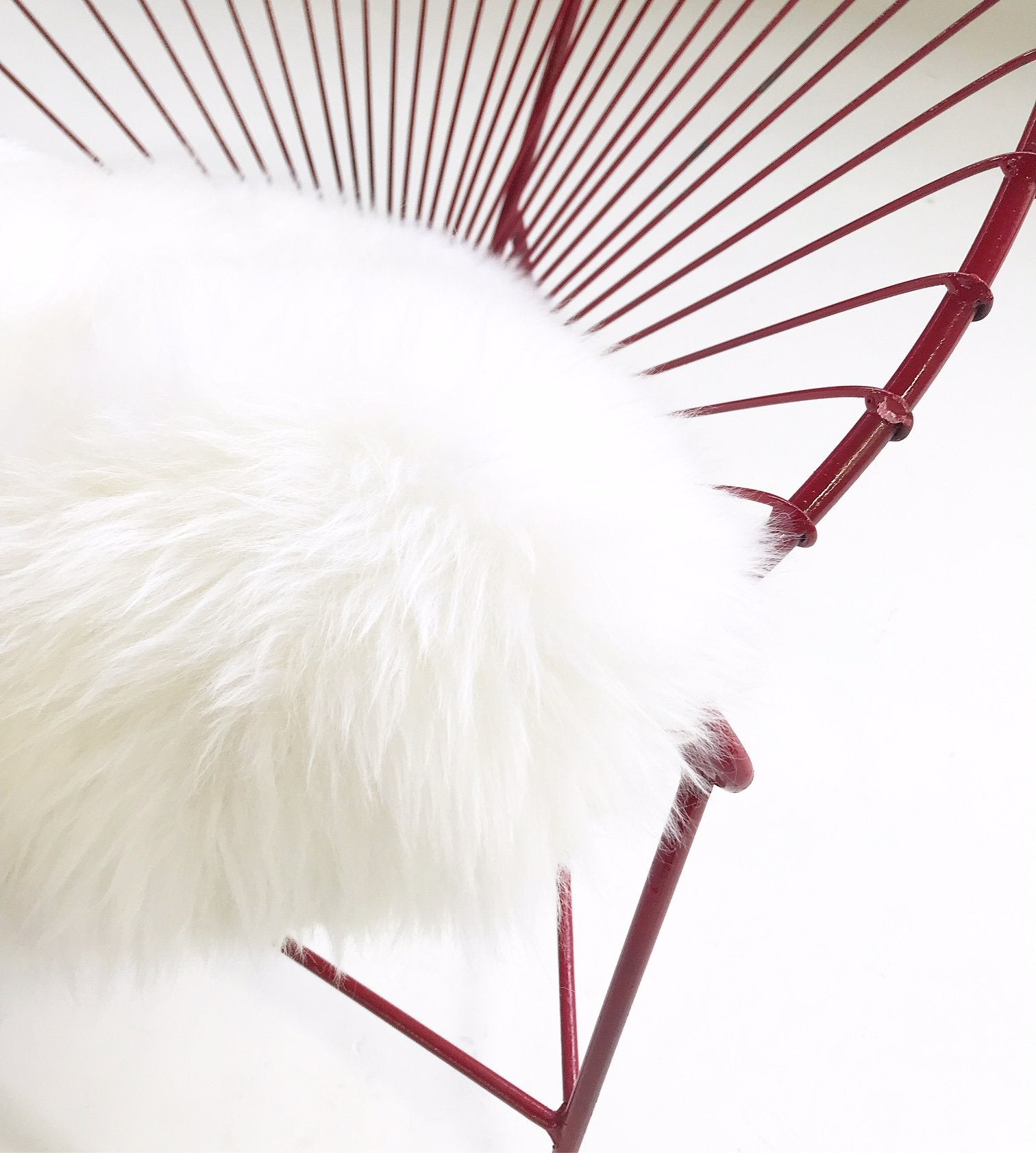 Red Metal Papasan Chairs with Sheepskin Cushions