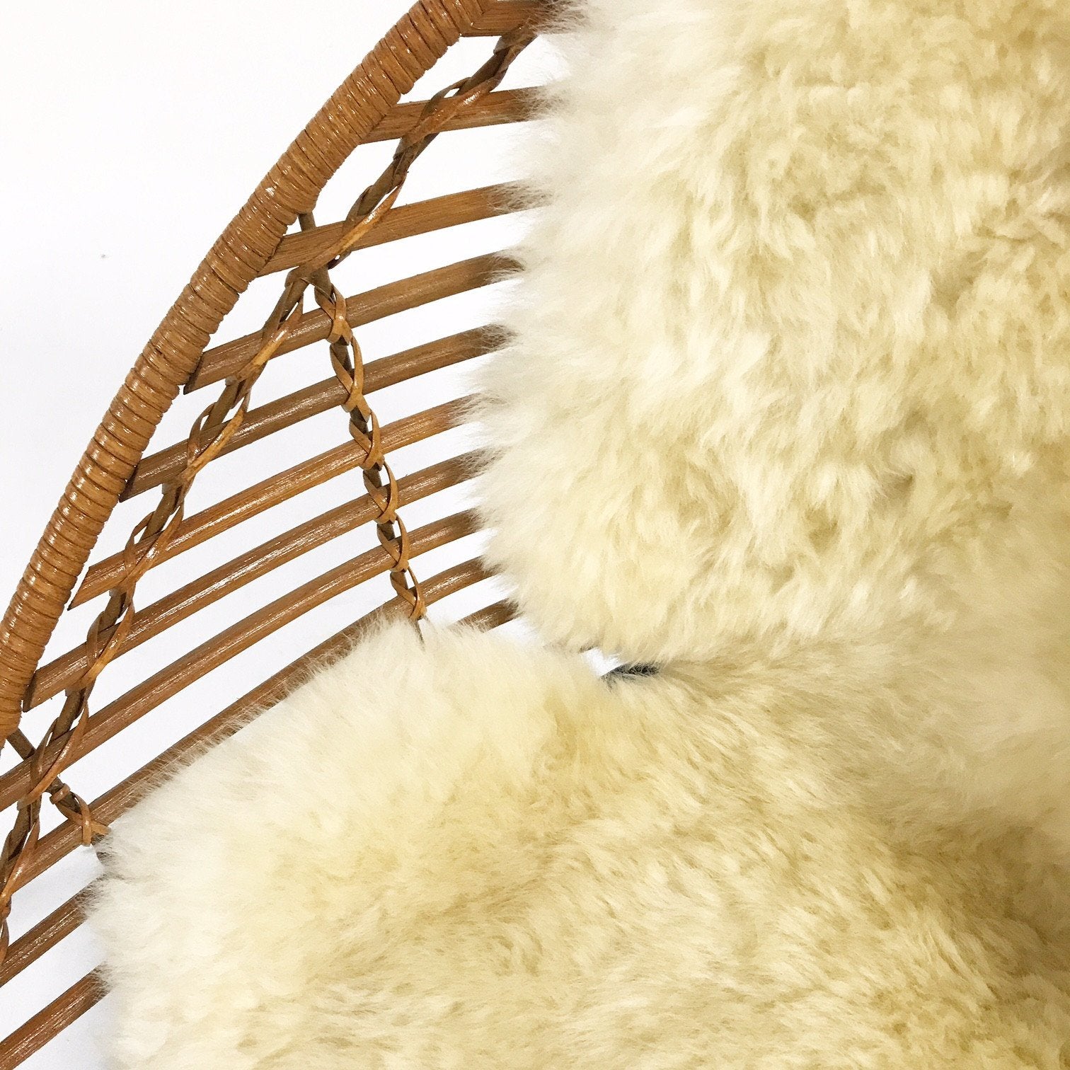 Mid-Century Iron and Rattan Chairs with Brazilian Sheepskins