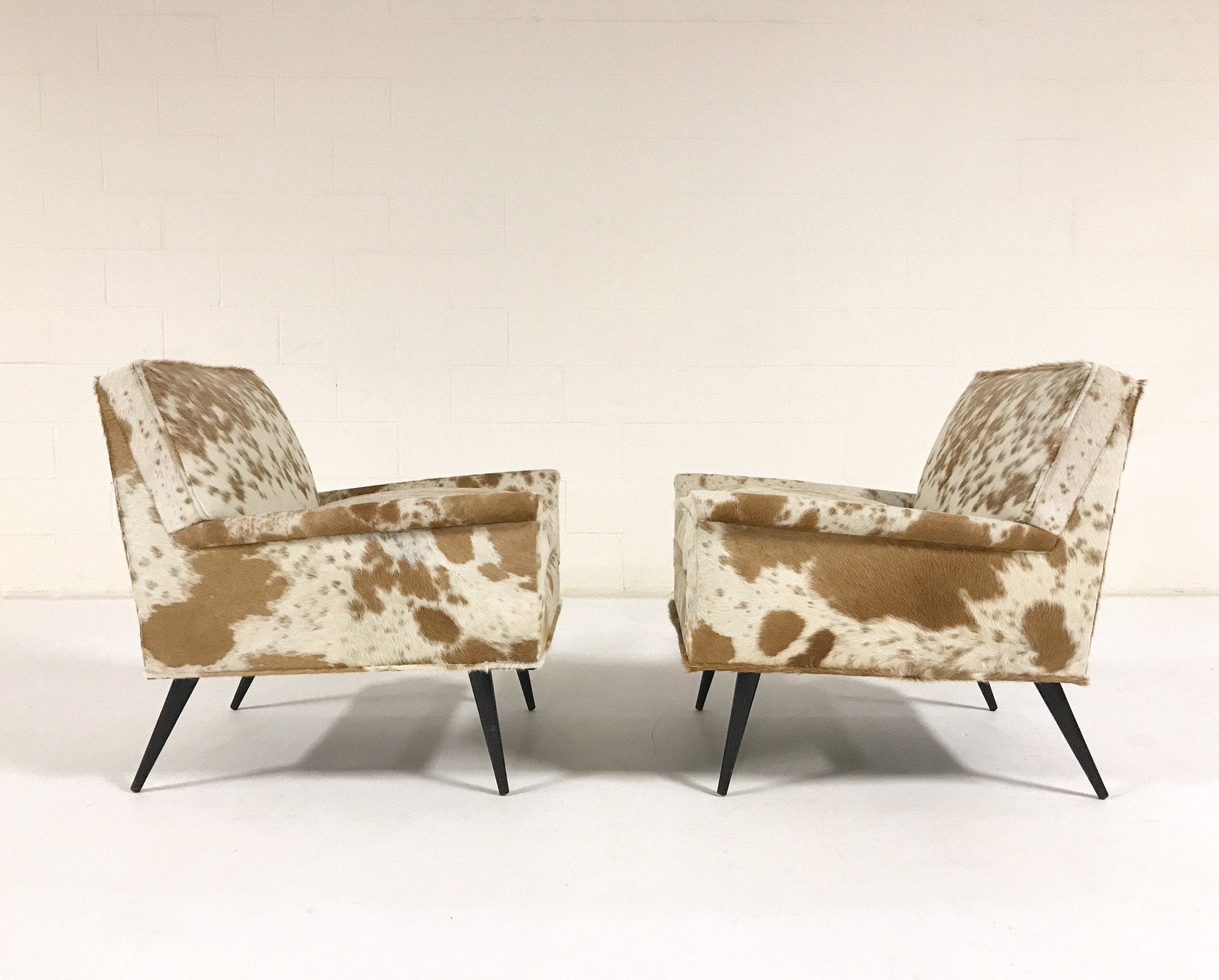 Paul McCobb Lounge Chairs in Palomino and White Cowhide
