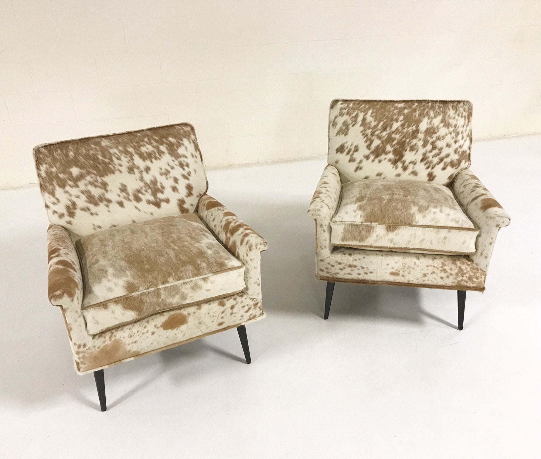 Paul McCobb Lounge Chairs in Palomino and White Cowhide