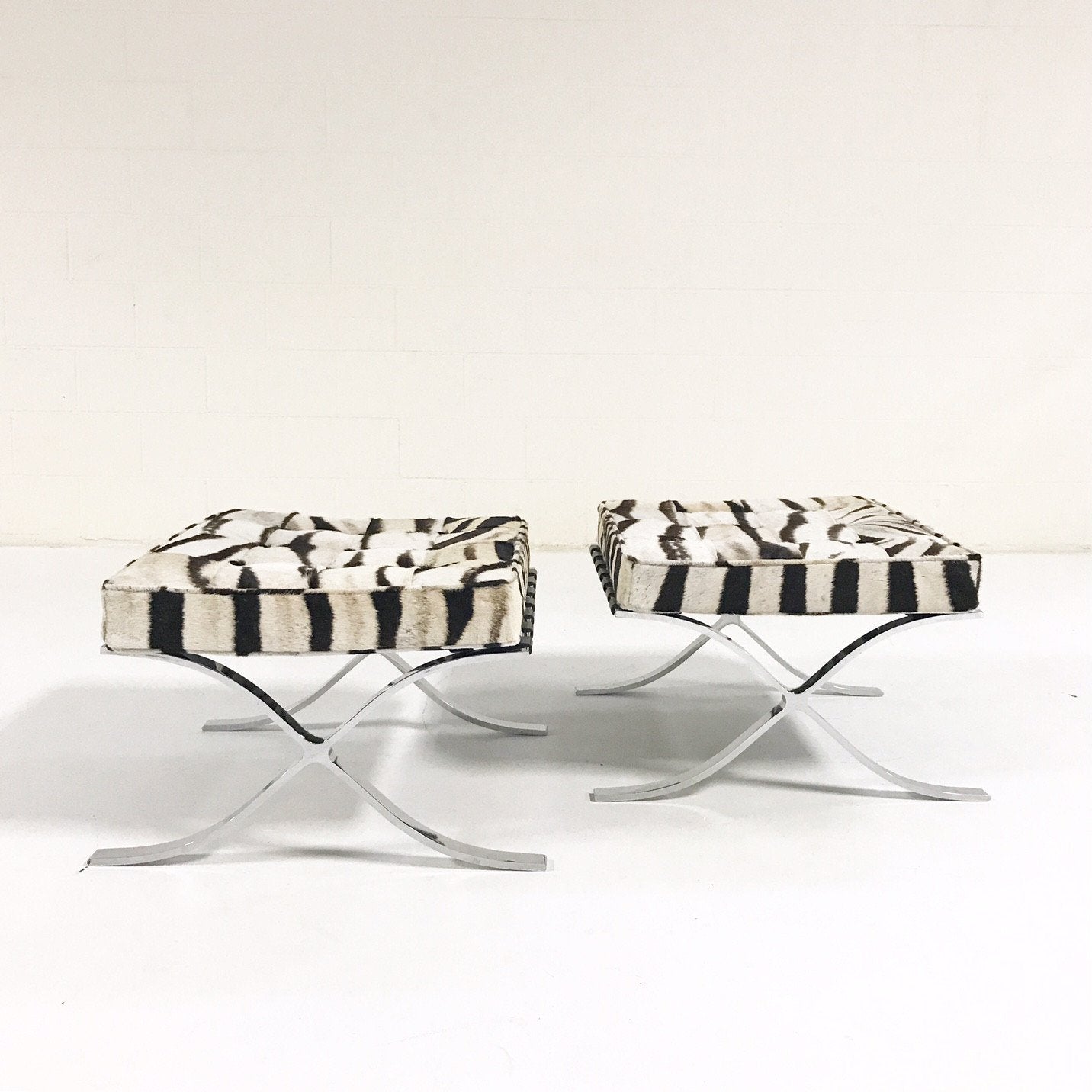 Pair of Barcelona Style Ottomans in Patchwork Zebra Hide