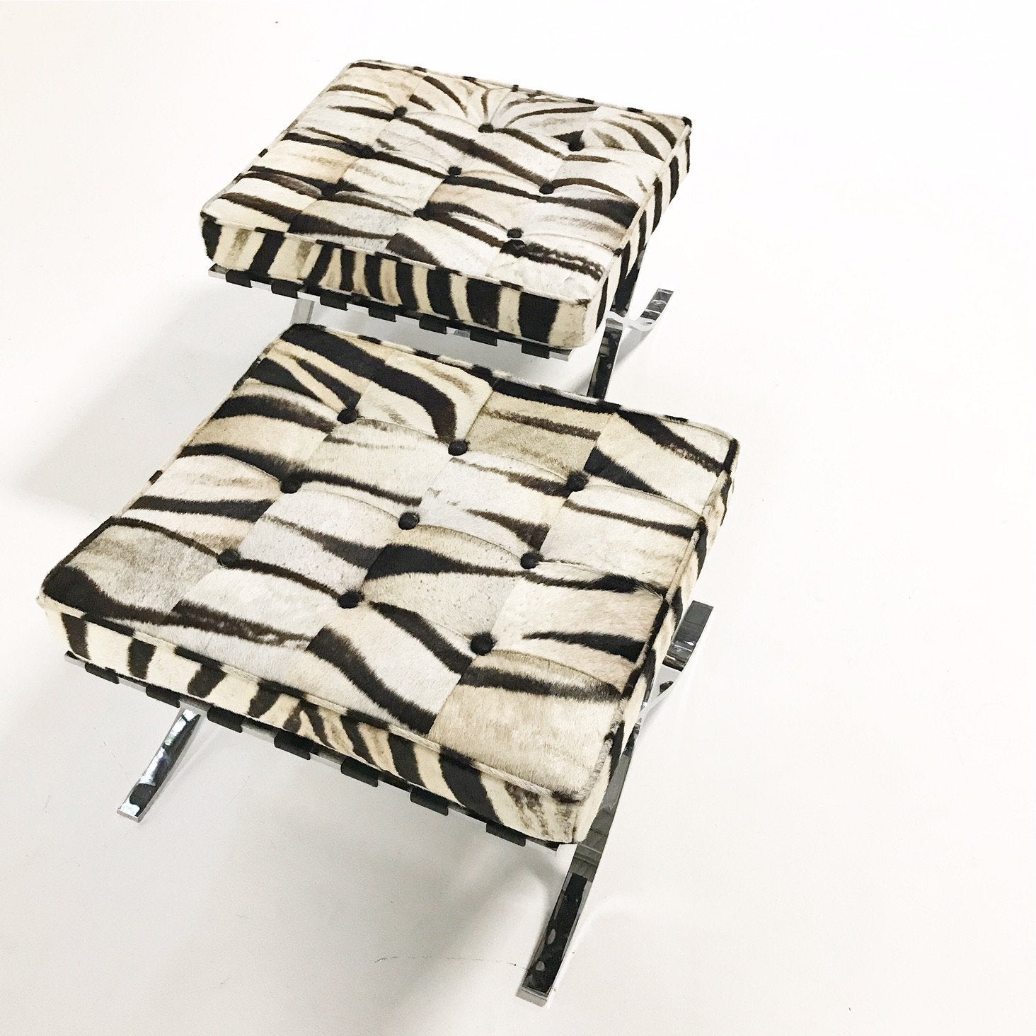 Pair of Barcelona Style Ottomans in Patchwork Zebra Hide