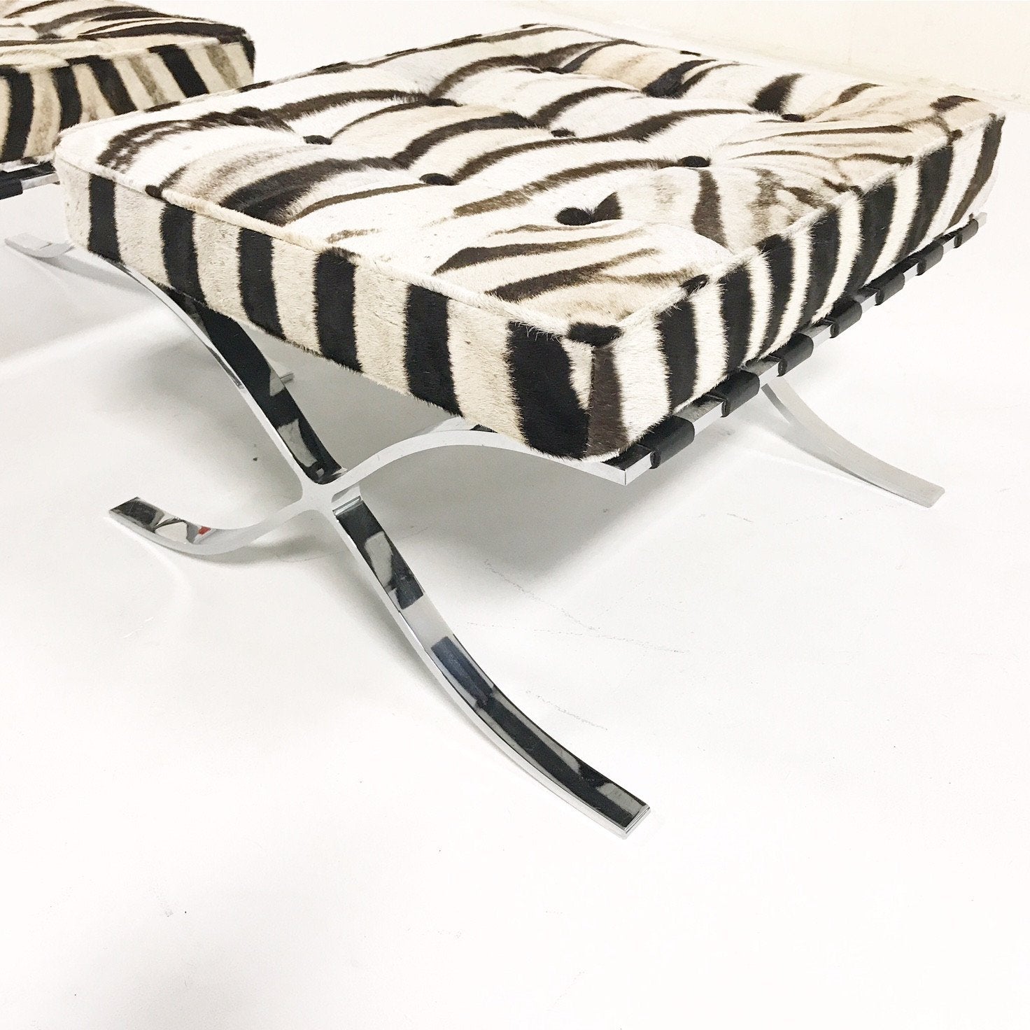 Pair of Barcelona Style Ottomans in Patchwork Zebra Hide