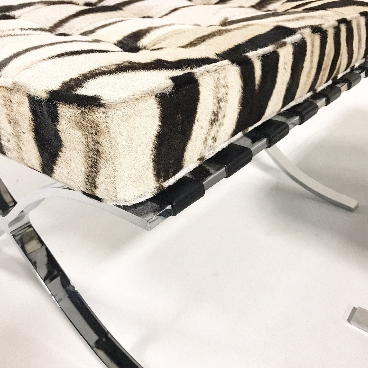 Pair of Barcelona Style Ottomans in Patchwork Zebra Hide