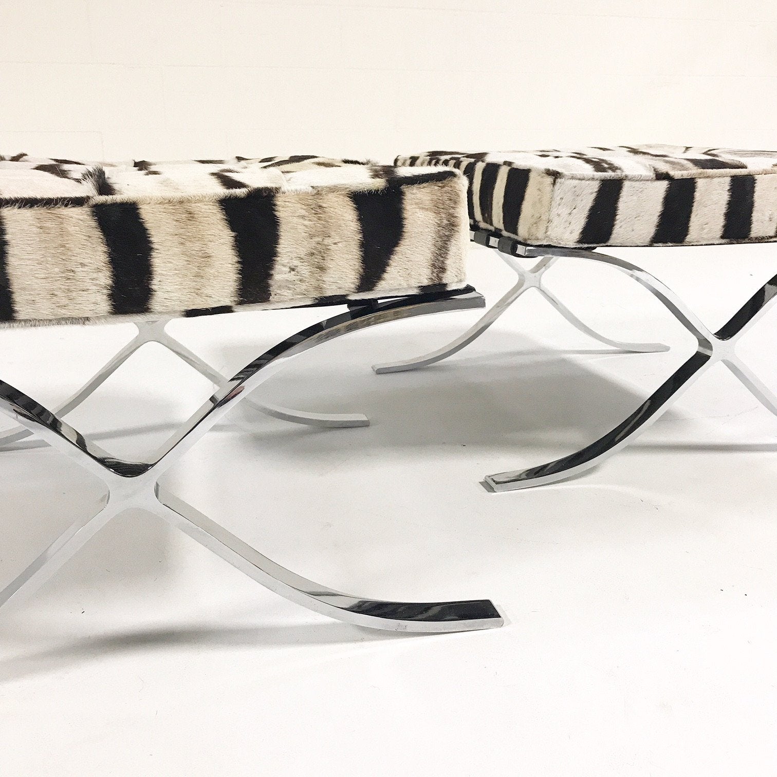Pair of Barcelona Style Ottomans in Patchwork Zebra Hide