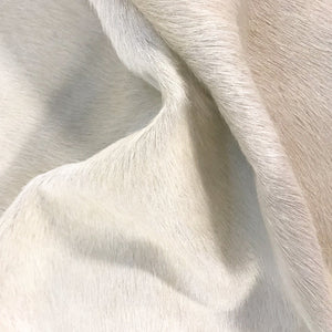 IVORY COWHIDE RUG - BUTLER