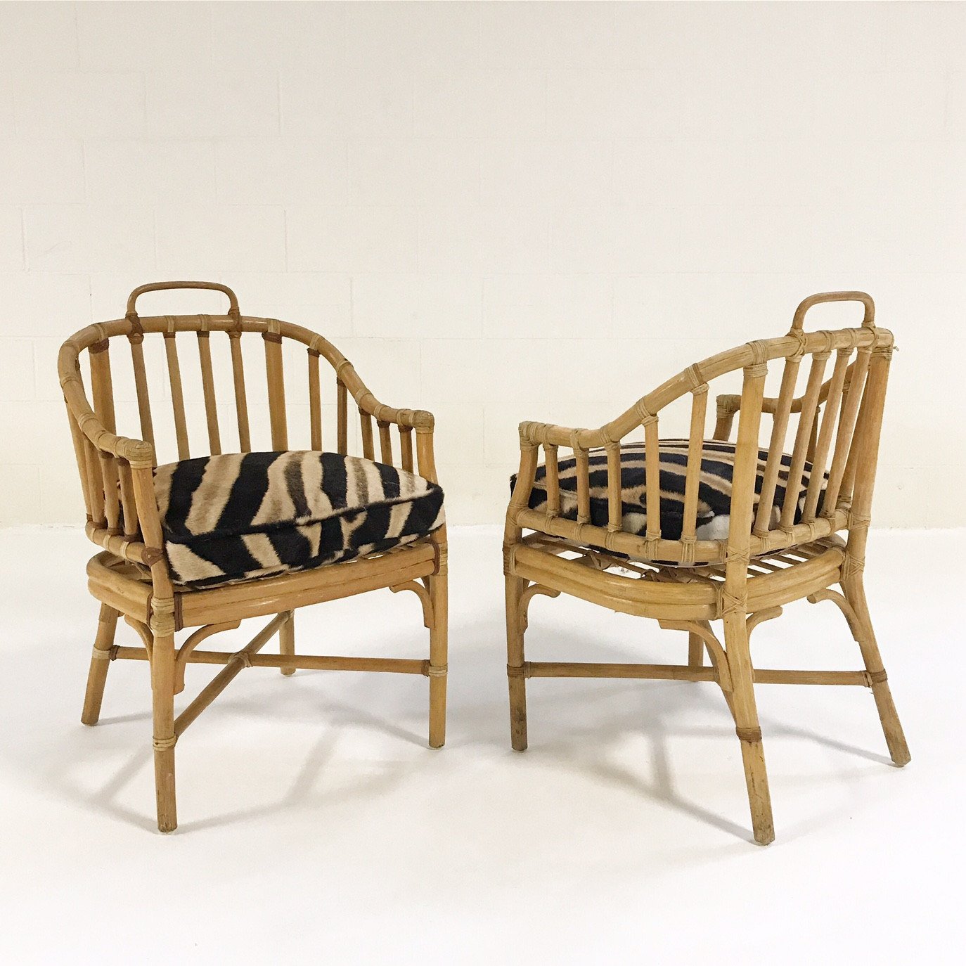 Pair of Rattan Armchairs with Zebra Hide Cushions