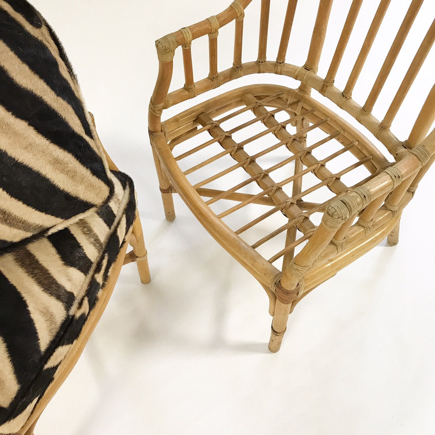 Pair of Rattan Armchairs with Zebra Hide Cushions