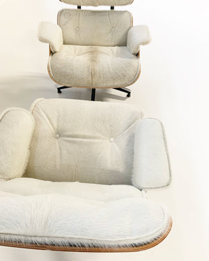 Charles and Ray Eames for Herman Miller 670 Lounge Chairs and 671 Ottomans in Brazilian Cowhide