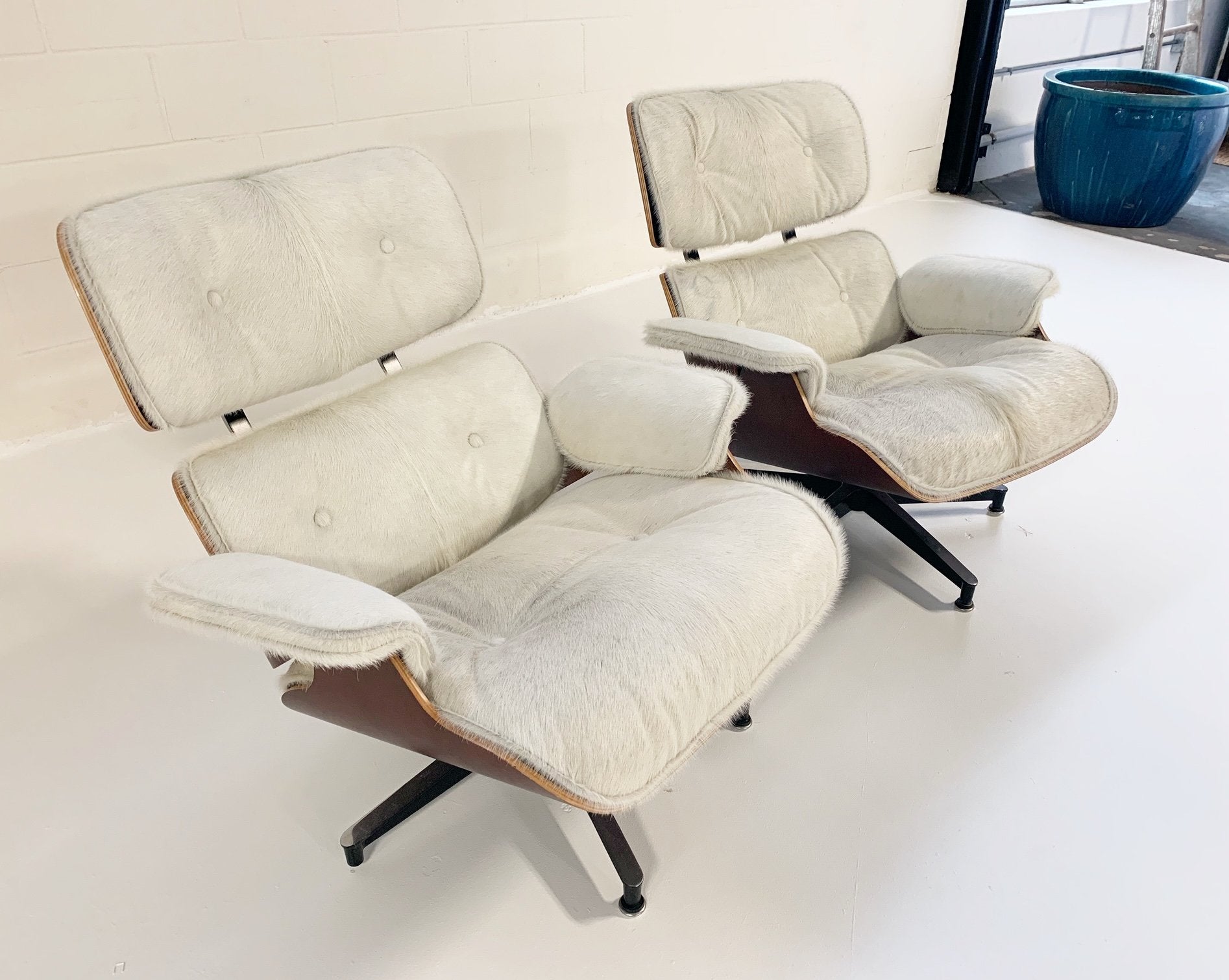 Charles and Ray Eames for Herman Miller 670 Lounge Chairs and 671 Ottomans in Brazilian Cowhide